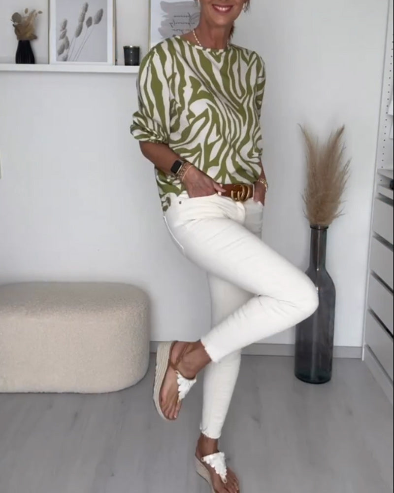 Bluse med rund hals med sebratrykk