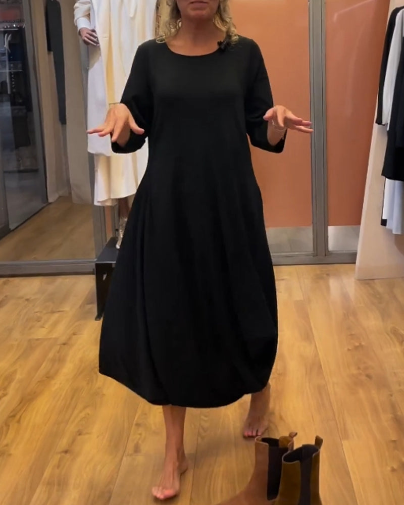 Kjole med lange ermer og rund hals