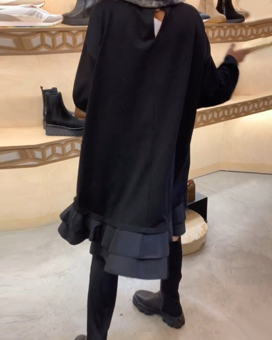 Kjole med elegant silhuett og lange ermer