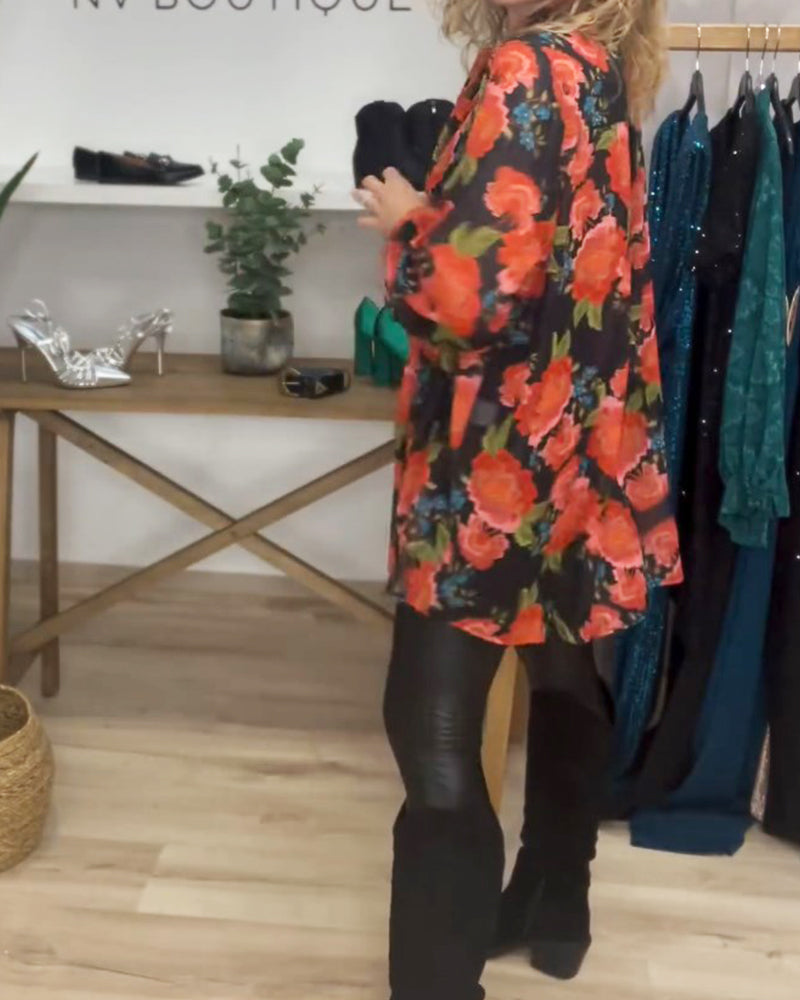 Bluse med blomstermønster og løs passform