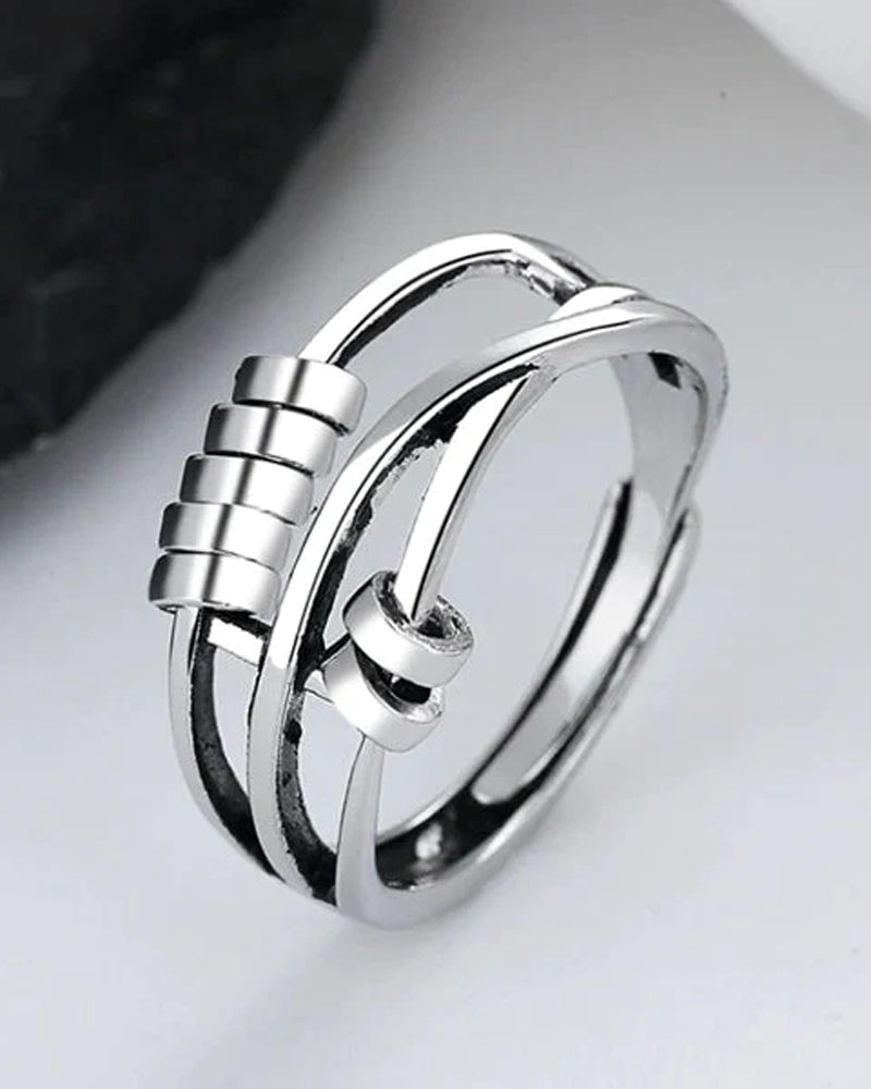 Elegant ring med angstreduserende spinnere