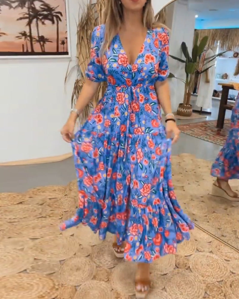 Kjole med rosetrykk og splitt