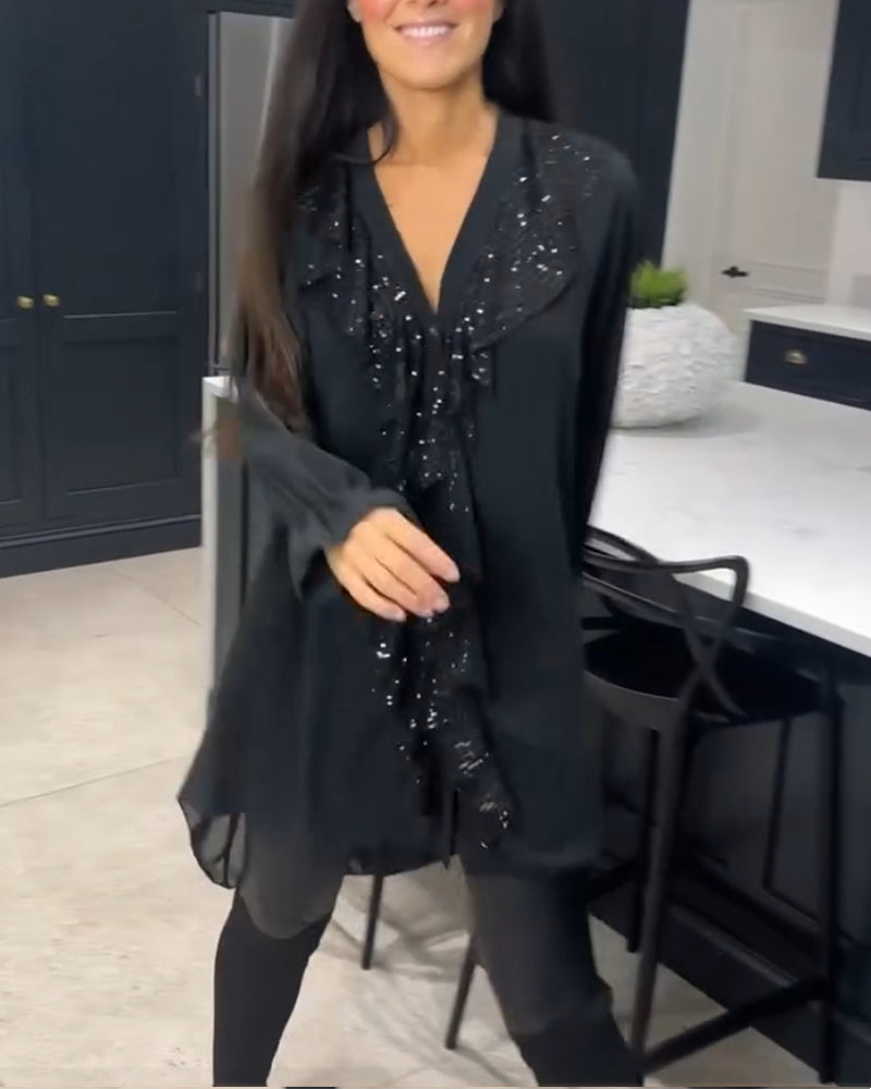 Bluse med volanger og elegant stil
