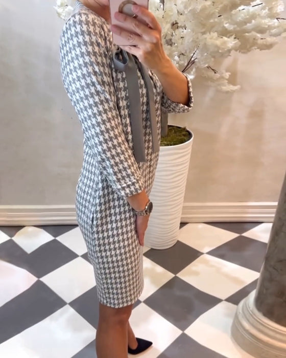 Kjole med elegant stil og houndstooth-mønster