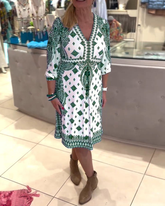 Elegant midikjole med V-hals