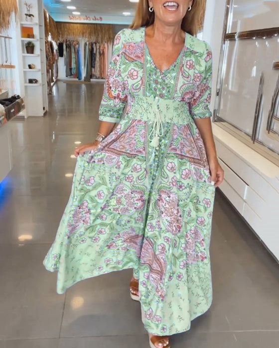 Feriekjole med V-hals og 3/4-ermet erme