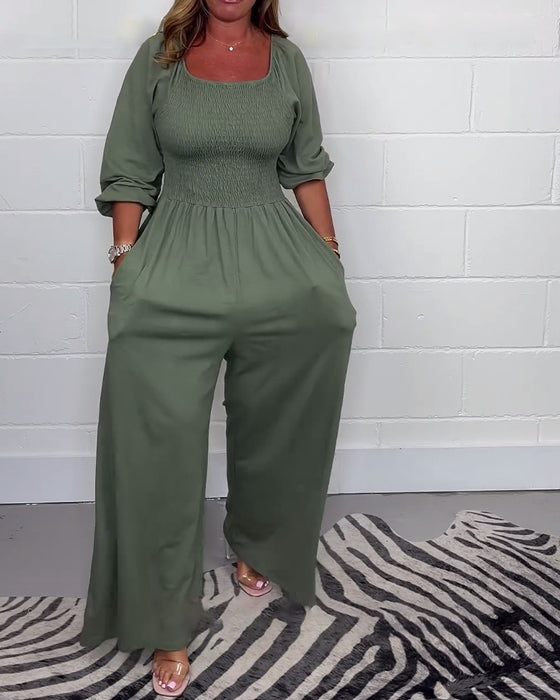 Ensfarget jumpsuit med firkantet hals