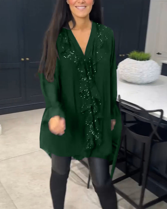 Bluse med volanger og elegant stil