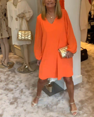 Ensfarget kjole med lanterne med V-hals