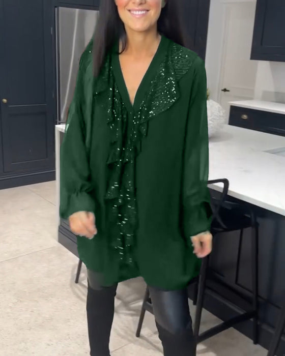 Bluse med volanger og elegant stil