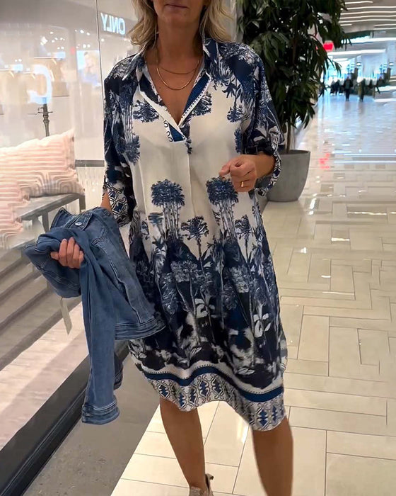 Uformell kjole med trekvart ermer i jakkeslag med botanisk trykk