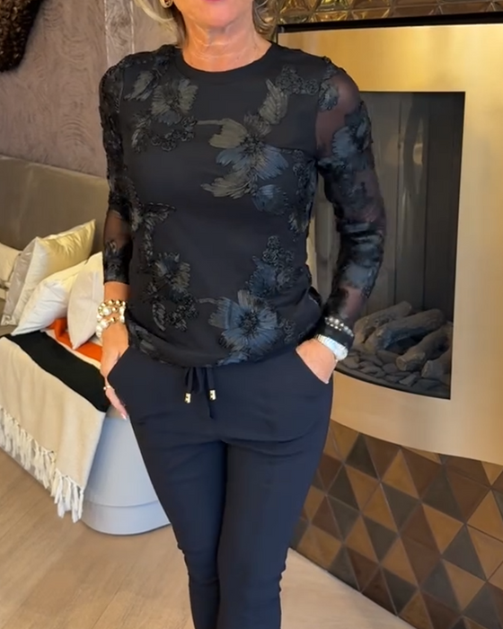 Stilfull Topp Med Rund Hals Og Lange Ermer