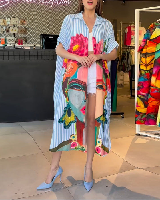 Vertikal stripete jakkeslagsbluse med karaktertrykk