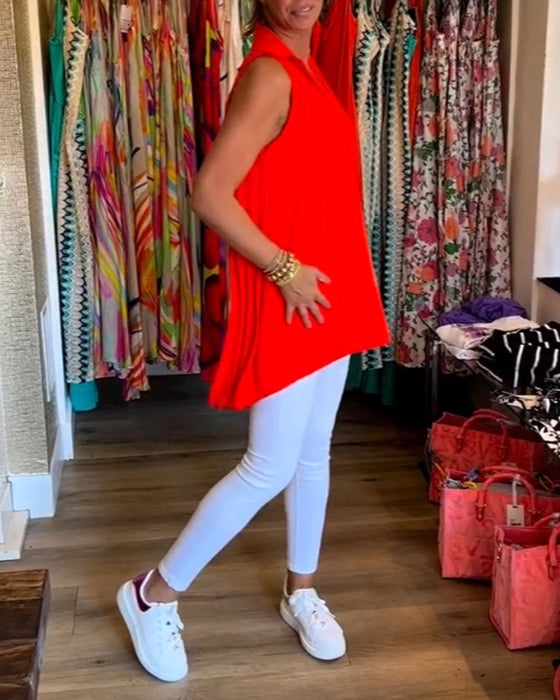 Ermeløs topp med volanger og jakkeslag