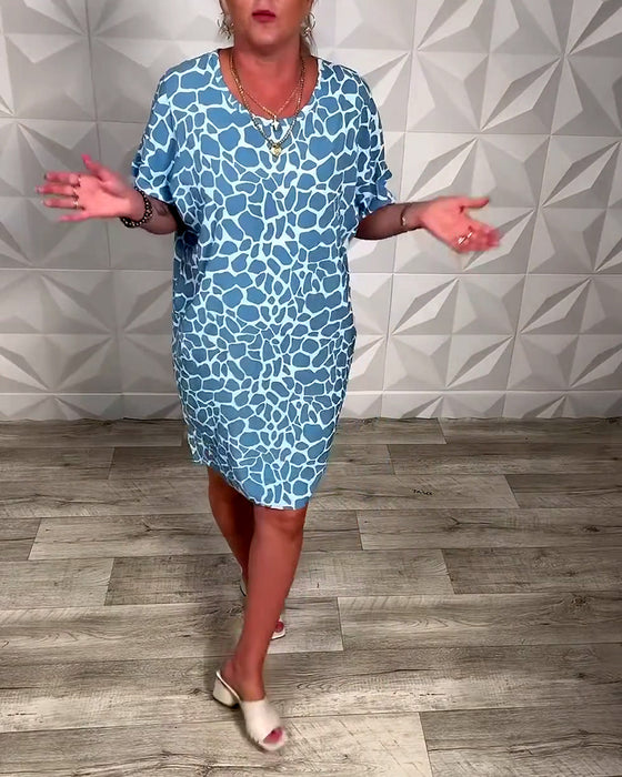 Kjole med rund hals og trykk