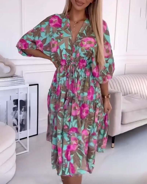 Elegant kjole med snøring og blomsterprint