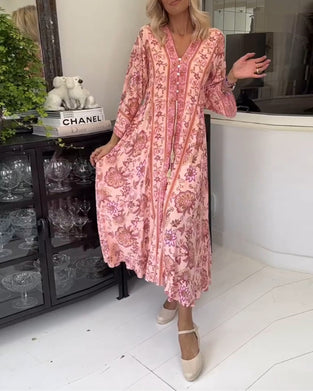 Elegant trykket V-hals-kjole med snøring