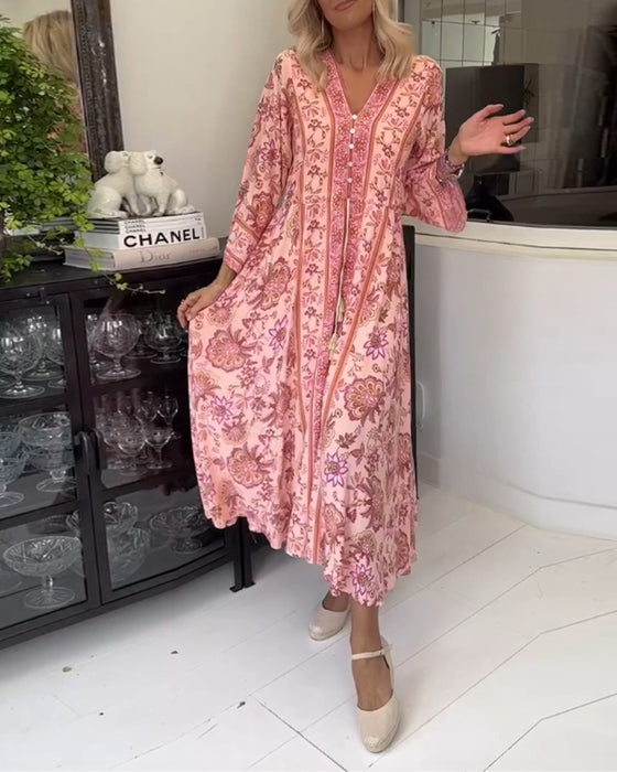 Elegant trykket V-hals-kjole med snøring