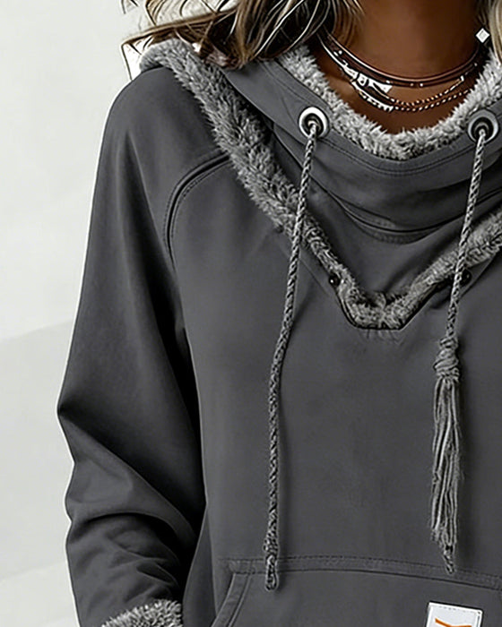 Langermet Genser Med Lappetæktsdetaljer Og Lomme