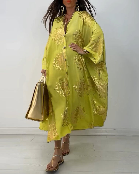 Langermet løs kjole med trykt knapp