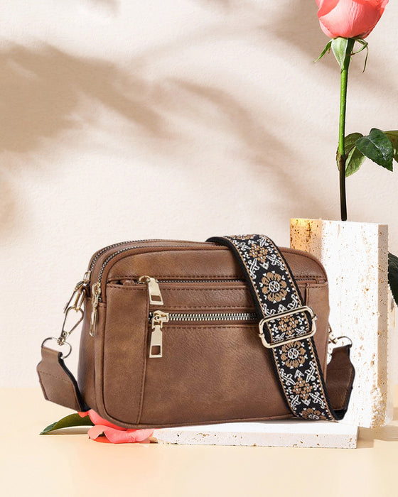 Multifunksjonell crossbody-veske med glidelås