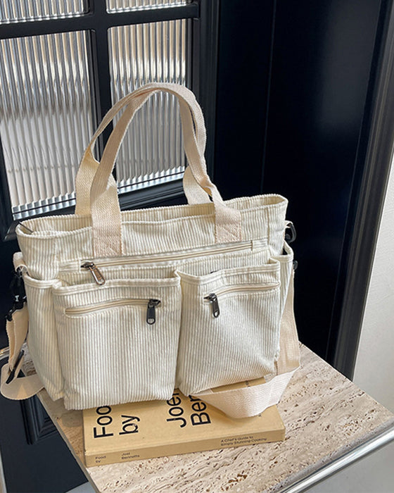 Ensfarget cordfløyelveske