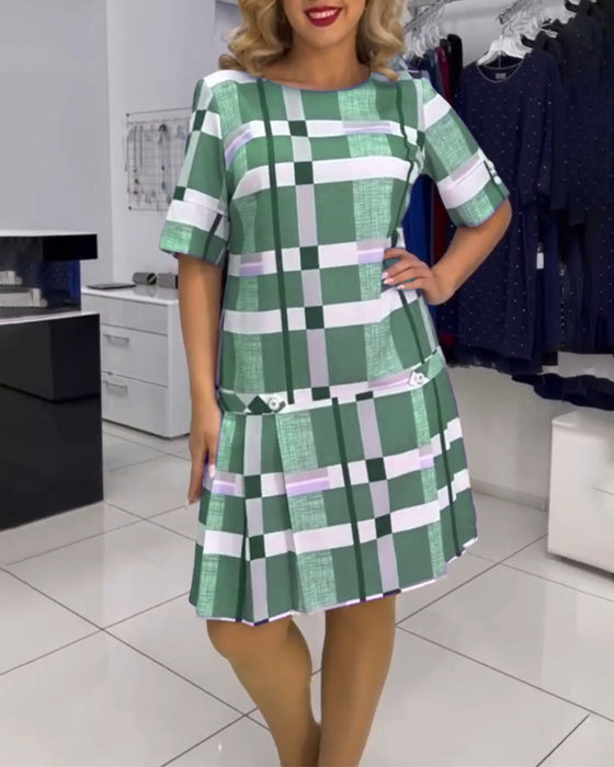 Kjole med rund hals og rutete