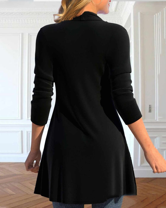 Topp med lappeteppe og paljetter og volanger