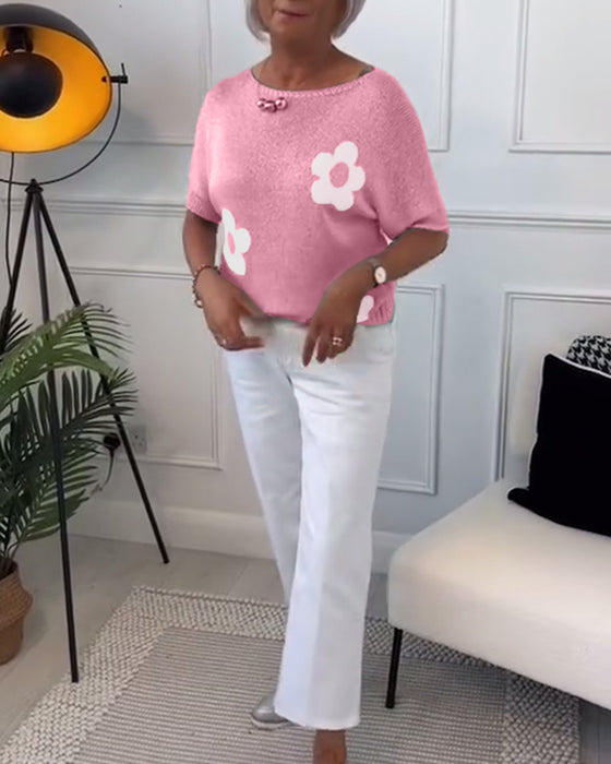 Slank blomstergenser med rund hals