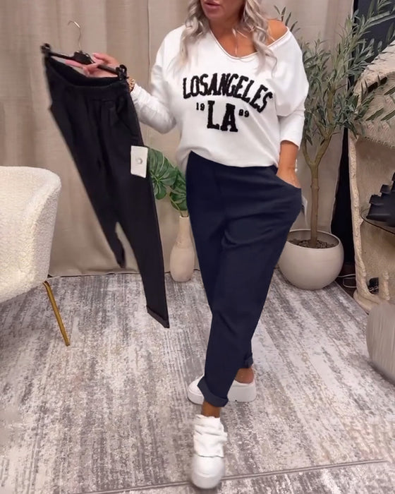 Uformelle ensfargede bukser med lomme