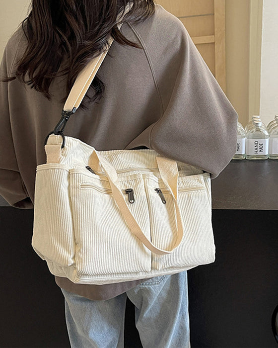 Ensfarget cordfløyelveske