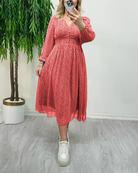 Elegant kjole med trykk med knapper