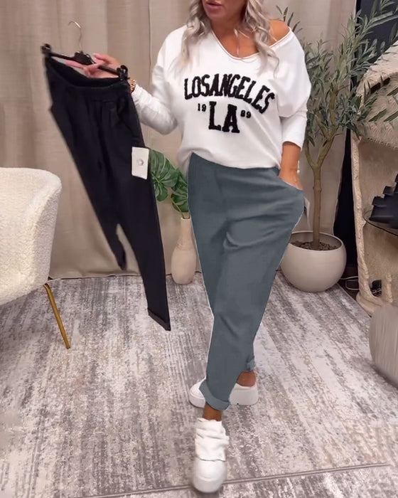 Uformelle ensfargede bukser med lomme