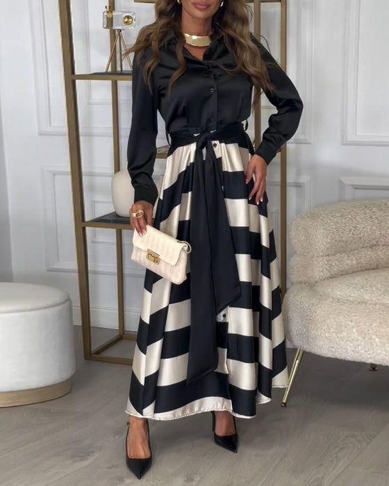 Elegant kjole med striper og jakkeslag