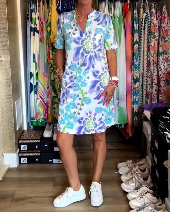 Kjole med korte ermer, blomsterprint og V-hals