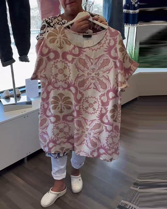 Uformell blomsterbluse med rund hals
