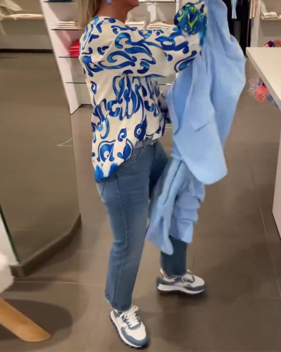 Elegant langermet topp med trykt V-hals