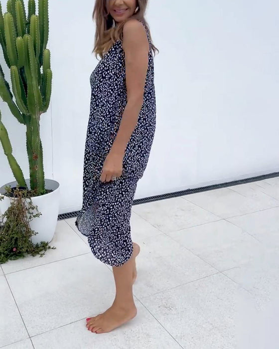 Ermeløs kjole med v-hals trykk