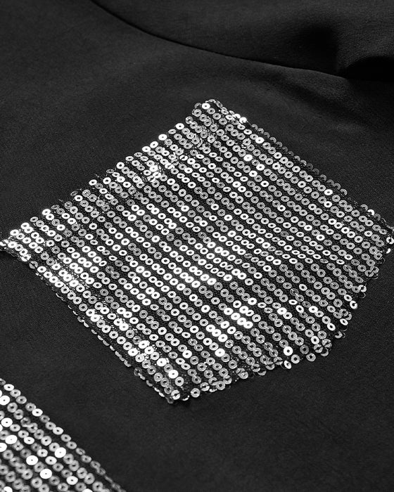 Avslappet topp med panel med paljettknapp