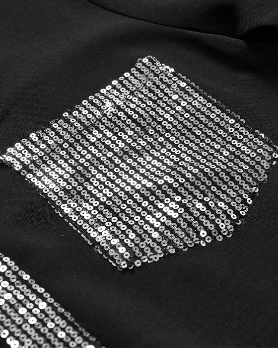 Avslappet topp med panel med paljettknapp