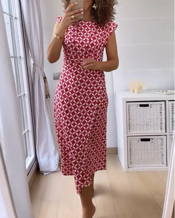 Ermeløs, elegant kjole med geometrisk trykk med rund hals