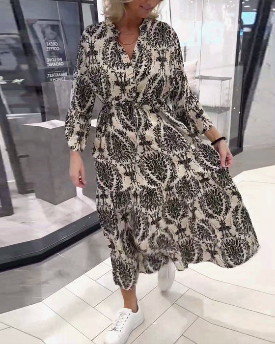 Kjole med snøring med klokkeermer