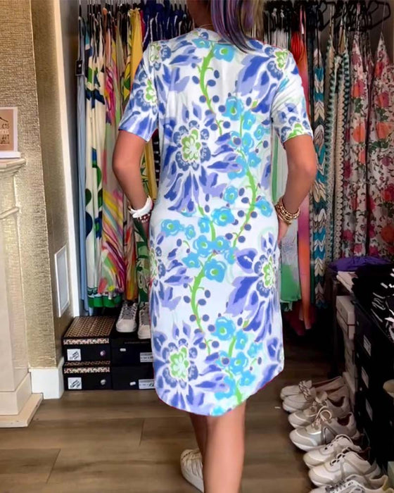 Kjole med korte ermer, blomsterprint og V-hals