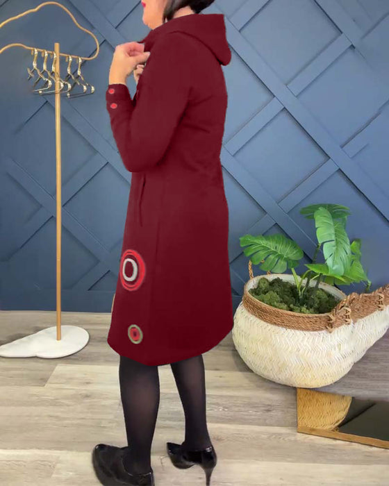 Uformell kjole med hette og hette med sirkeltrykk