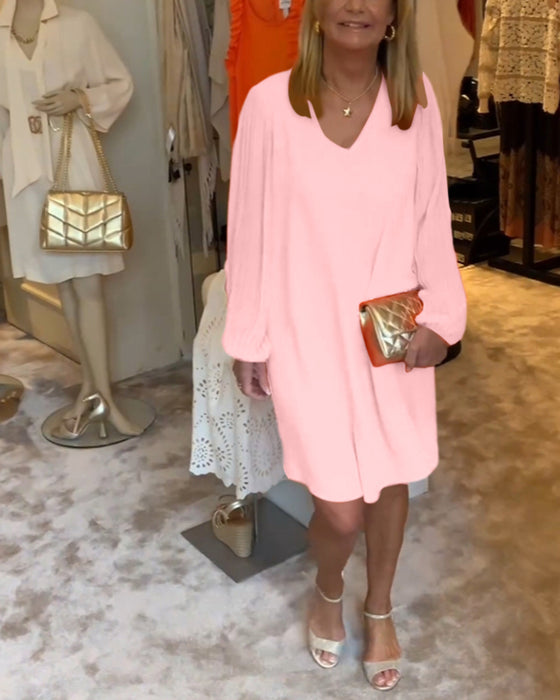 Ensfarget kjole med lanterne med V-hals