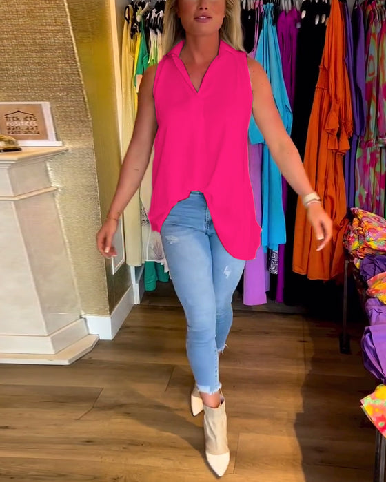 Ermeløs topp med volanger og jakkeslag