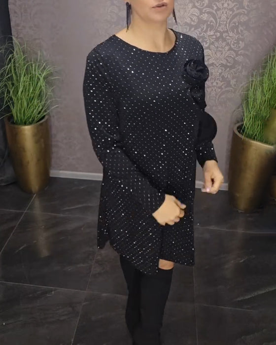 Elegant kjole med rund hals og lange armer i diamant