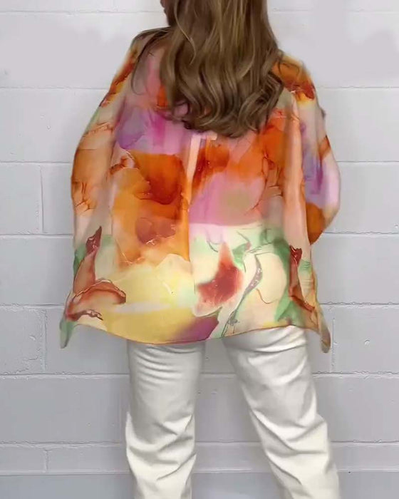 Uformell trykket V-hals bluse med lange ermer