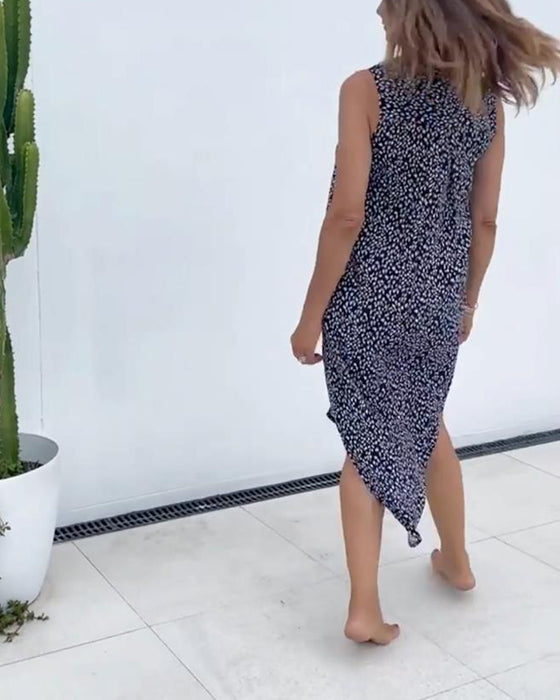 Ermeløs kjole med v-hals trykk