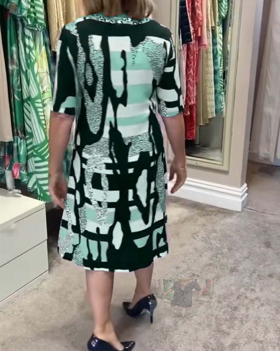 Midikjole med leopardmønster for kvinner